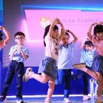 kids performing a dance, with cute heart dance move